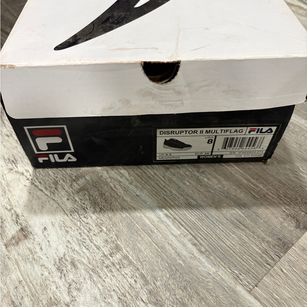 Black and white Fila wedges
